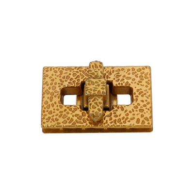 Поверхность золота оборудования замка сумки извива украшения коррозии штейновая